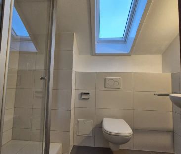 Elegante 2-Zimmer-Dachgeschosswohnung mit Einbauküche und KFZ-Stell... - Foto 6