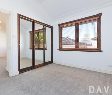 Fall in Love with This Stunning 4-Bedroom Coastal Retreat! - Photo 1