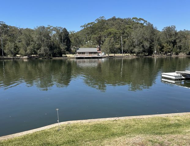 Riverside Retreat | 6-8 Month Lease Only - Photo 1