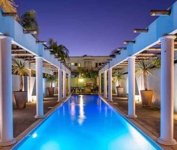 Chic & Sunlit 2-Bedroom Townhouse | Vista Rosa - Photo 4