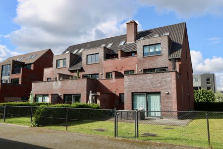 Ruim appartement met twee slaapkamers, groot terras en carport! - Photo 4