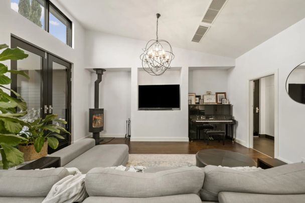 Luxury Tudor Residence with Modern Elegance and Family Appeal - Photo 1