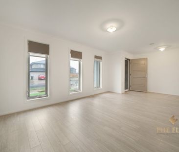 4-Bedroom Home with Multiple Living Areas - Photo 3