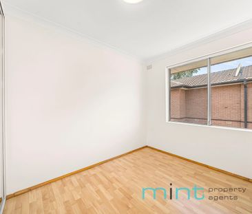 Freshly painted 2-bedroom unit available now - Photo 6