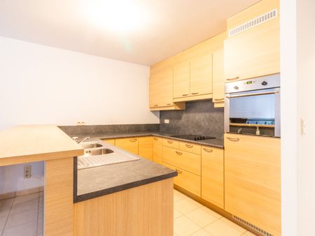 Ruim 2-slaapkamerappartement met terras en garagebox! - Photo 4