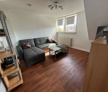 Gemütliche Dachgeschosswohnung in stadtnaher Wohnlage! - Foto 1