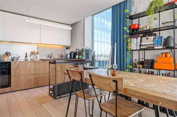 A top floor two bedroom apartment with stunning views in the Barts Square development. - Photo 1