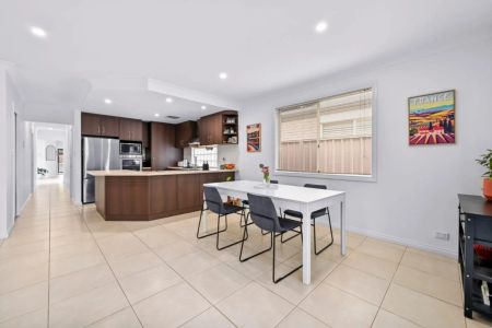 Spacious, Modern Elegance, and Perfectly Located Coastal Gem 3 Beds | 2 Baths | 1 Garage | - Photo 4