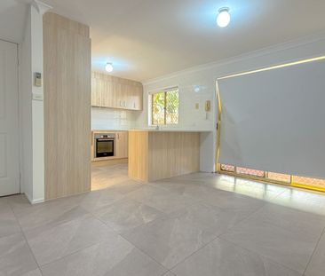 NEWLY RENOVATED - Photo 2