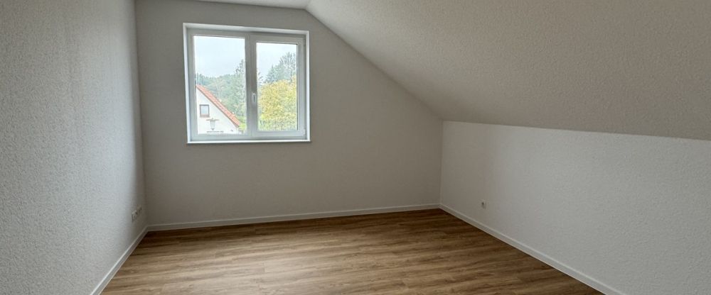 Obergeschosswohnung in einem charmanten Doppelhaus im Hörneweg! - Photo 1