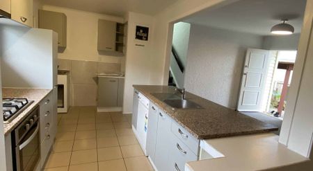 Spacious 3-Bedroom Family Home with Huge Backyard - Photo 2
