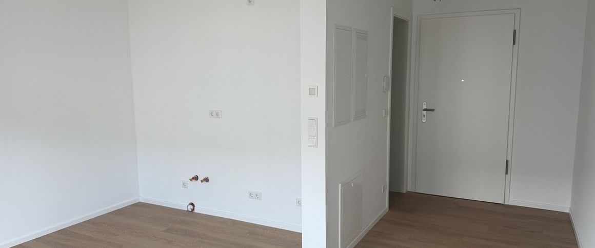 Neubau-Erstbezug! Stilvolle 1-Zimmer-Wohnung in zentraler Lage - Photo 1