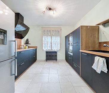 Location Maison 5 pièces 110m² BECON LES GRANITS 49370 - Photo 6