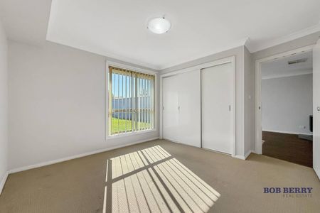 Comfortable 3 Bedroom Home with Large Shed - Photo 4