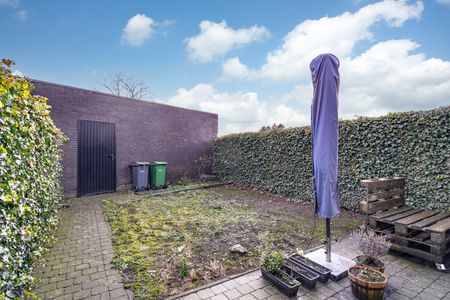 GELIJKVLOERSAPPARTEMENT MET TUIN EN GARAGE - Photo 4