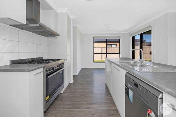 BEAUTIFULLY KEPT HOME IN GROWING AREA - Photo 1