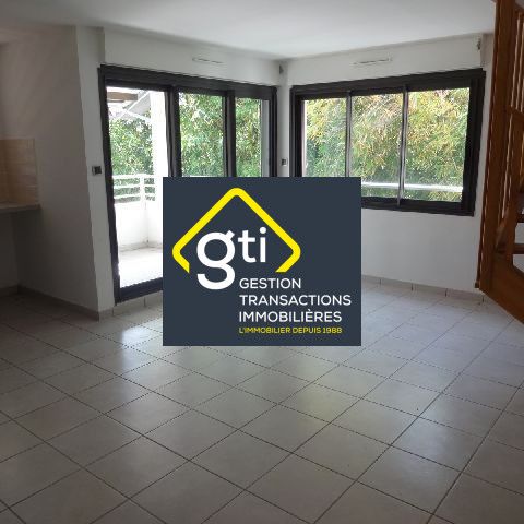 Location Appartement 3 pièces 56m² STE CLOTILDE 97490 - Photo 1