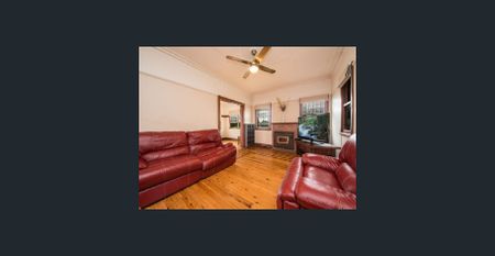 The Whole Package! Spacious 5-Bedroom Home + Sheds Galore! - Photo 2