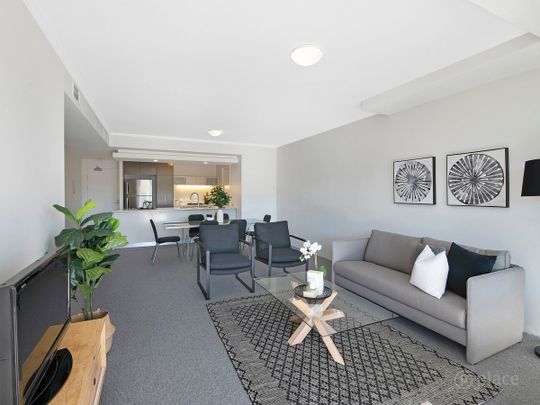 Inner-City Living within Roma Street Parklands - Photo 1