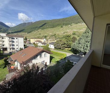 Pleasant 3.5-room apartment with balcony and unobstructed view - Photo 1