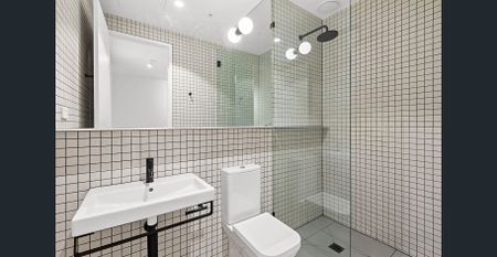 Stylish Lakeside Apartment with Inner-City Convenience - Photo 5