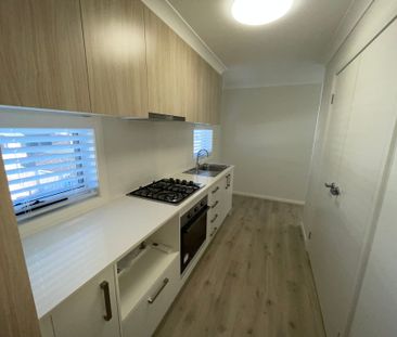 Immaculate Near-New One-Bedroom Apartment Featuring Lock-Up Garage - Photo 4