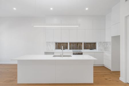 Coastal Living at Its Finest - Modern 3-Bedroom Duplex Steps from the Beach - Photo 2