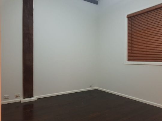 Where Style Meets Height in One Perfect Space! - Photo 1