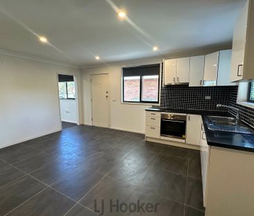 Neat & Tidy 1 Bedroom Unit in Sought After Speers Point - Photo 1