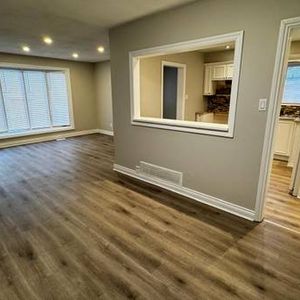 Beautifully Renovated 3-Bedroom Bungalow main floor unit - Photo 2