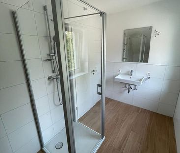 Schöne 3 Zimmer Wohnung mit Parkplatz, Balkon und Garten - Foto 1