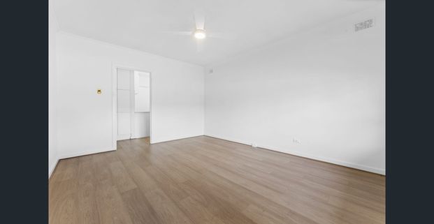 Freshly Updated & Street-Fronted Home in a Prime School Zone - Photo 1