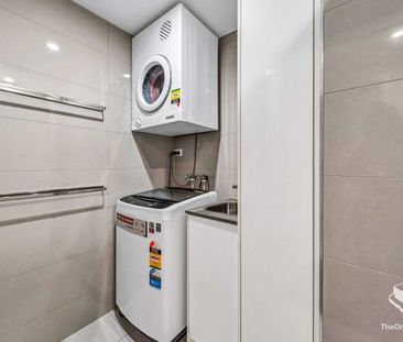 Stylish Two-Bedroom Unit in Prime Location - Photo 6