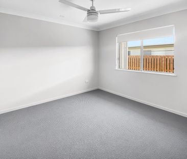 Modern Family Home in Sought-After Bushland Beach - Photo 2