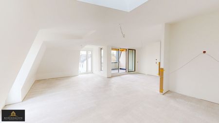 Luxuriöse 3-Zimmer-Dachgeschosswohnung mit exklusiver Ausstattung, zwei Bädern und Dachterrasse! - Photo 2