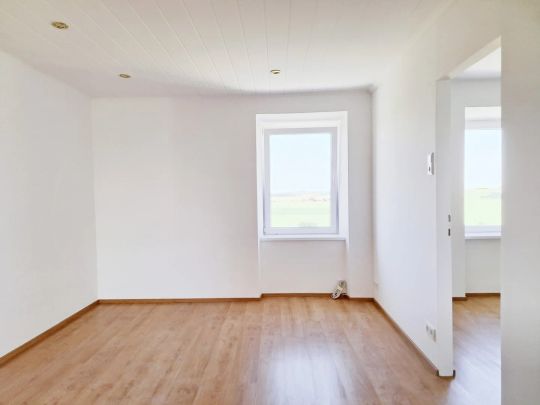 Eine helle Wohnung im Grünen! - Foto 1
