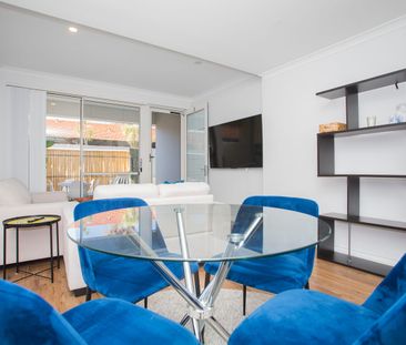 Fully Furnished 2x2 Apartment Near the Beach! - Photo 1