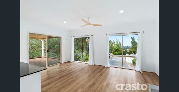 Short or Long Term Rental for your Extended family in Tallai. Secure undercover parking for caravan, boat & many cars. Huge Shed with mezzanine. - Photo 1