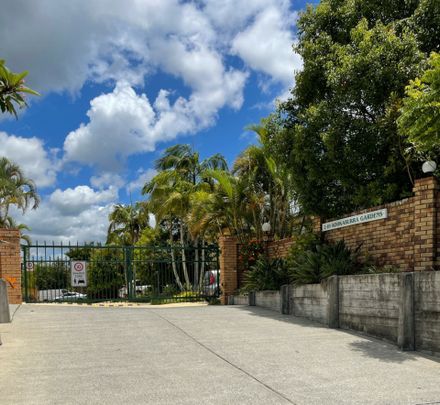 NEAT TOWNHOUSE WITH POOL IN COMPLEX - Photo 1