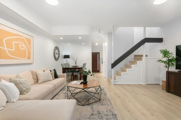 Contemporary Family-Sized Townhouse with Exceptional Convenience - Photo 1