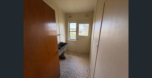 Spacious Family Home with Sunlit Charm - Photo 1