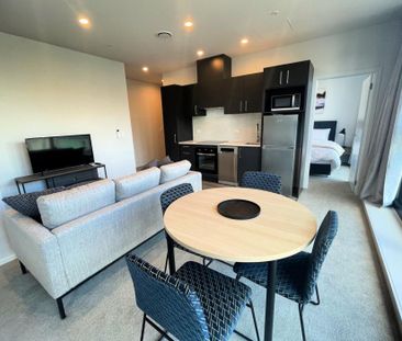 Two bedroom, two bathroom penthouse corner apartment - Photo 3