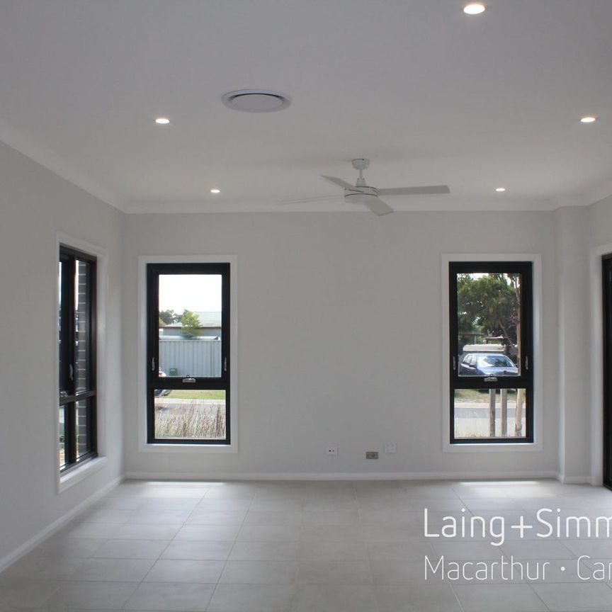 Brand New - 5 Bedroom + Multiple Living Areas - Photo 1