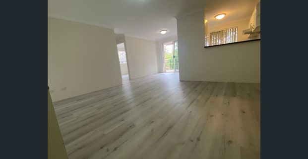 Spacious 2-Bedroom Security Unit in Convenient Location - Photo 1