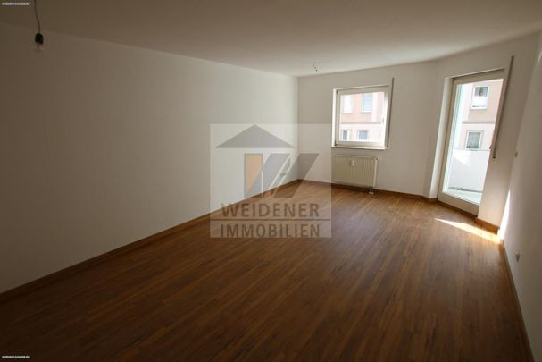 Wohnfreundliche 3-Raum-Wohnung mit Balkon und Tiefgaragenstellplatz! - Photo 1
