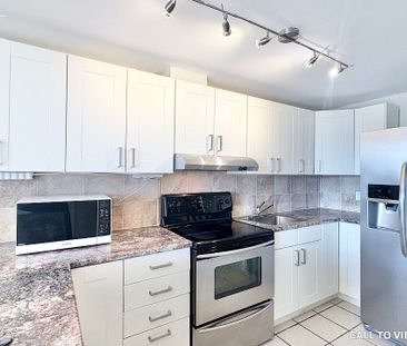 GORGEOUS 2-BEDROOM CONDO WITH MODERN FINISHES - Photo 2