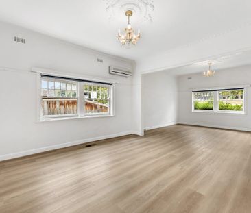 Spacious Three-Bedroom Home with Exceptional Convenience - Photo 2