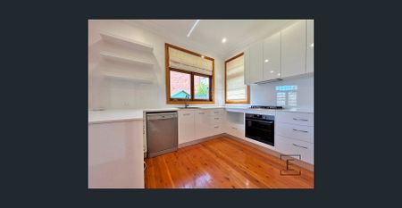 Spacious 3-Bedroom Home with Garden Bliss! - Photo 4