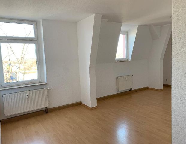Schöne 3-Zimmer Wohnung im DG in Haus mit großem Garten - Photo 1