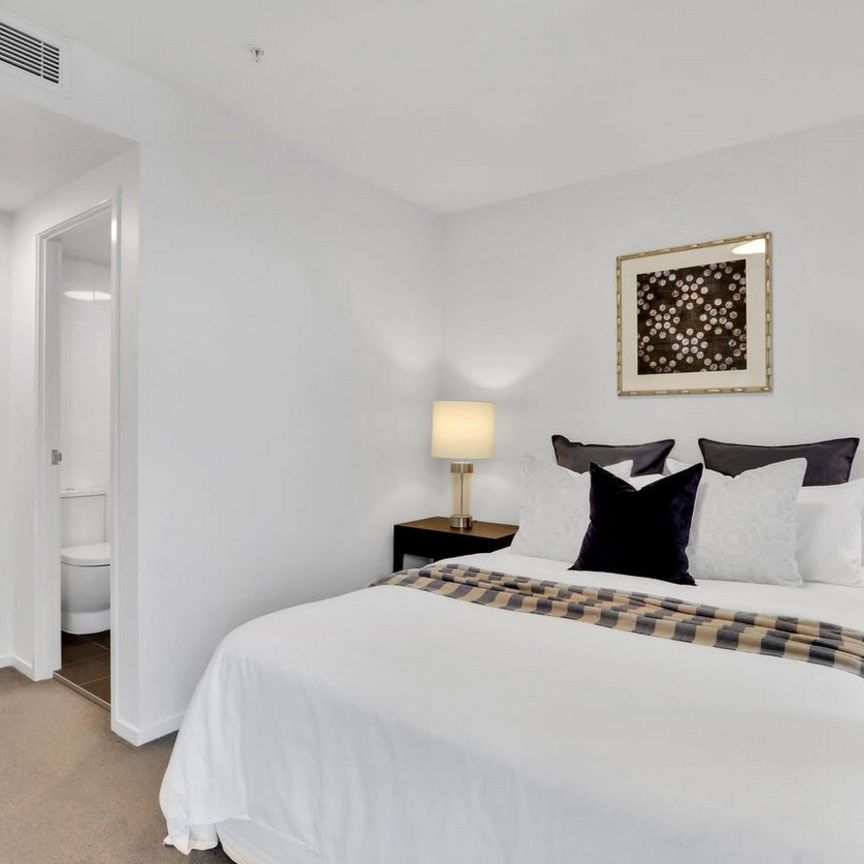 Modern Inner-City Living with River Views at Skyring Apartments - Photo 1